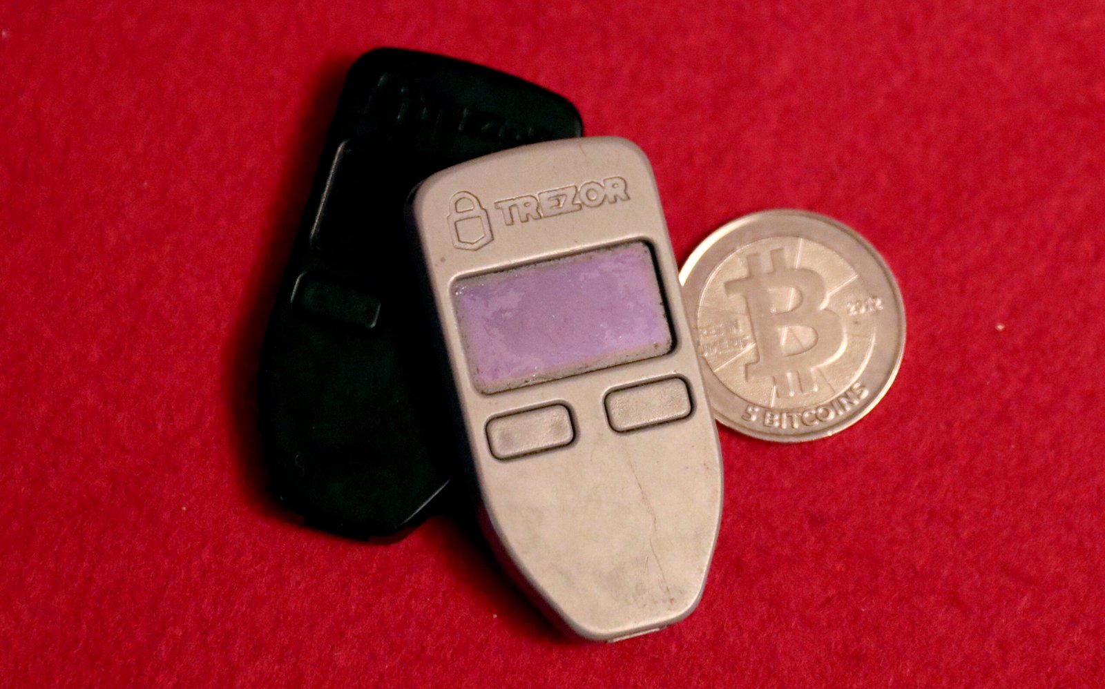 Two Trezor One hardware wallets and a 5BTC Casascius physical coin by Gage Skidmore